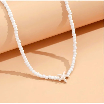 Minimalist White Beaded Necklace with Starfish Pendant – Handmade Jewelry